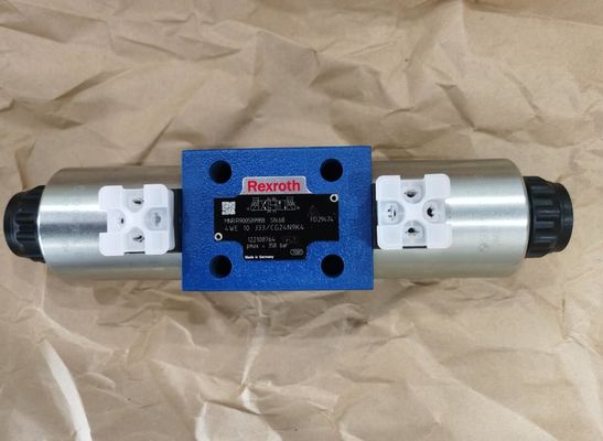 Rexroth R900589988 4WE10J3X / CG24N9K4 4WE10J33 / CG24N9K4 صمامات بكرة اتجاهية ، تعمل مباشرة ، مع ملف لولبي Actua